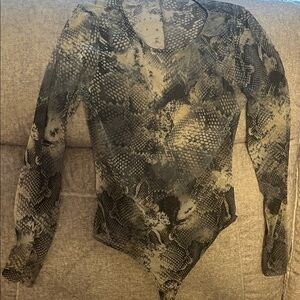 Semi sheer snake print long sleeve thong bodysuit.